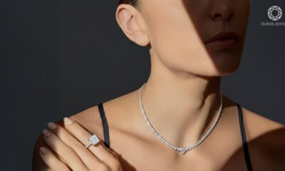 Model wearing lab grown diamond necklace and ring, representing the modern shift in the diamond jewelry market